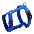 Blue paisley patterned dog harness with black plastic buckles and a metal ring, shown on a white background.